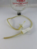 M*A*S*H 4077th Vodka IV-Drip Dispenser Bottle by Hawkeye Distilling Co. approx. 9" product image for Just Stuff I Sell, clear front view, neutral background, original listing photo, optimized descriptive alt text, centered composition variant 5