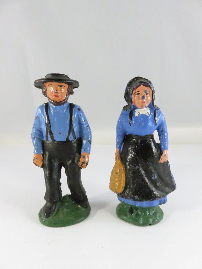 Vintage Cast Iron Amish Couple Figurines Hand-Painted Blue & Black approx. 4 1/4"