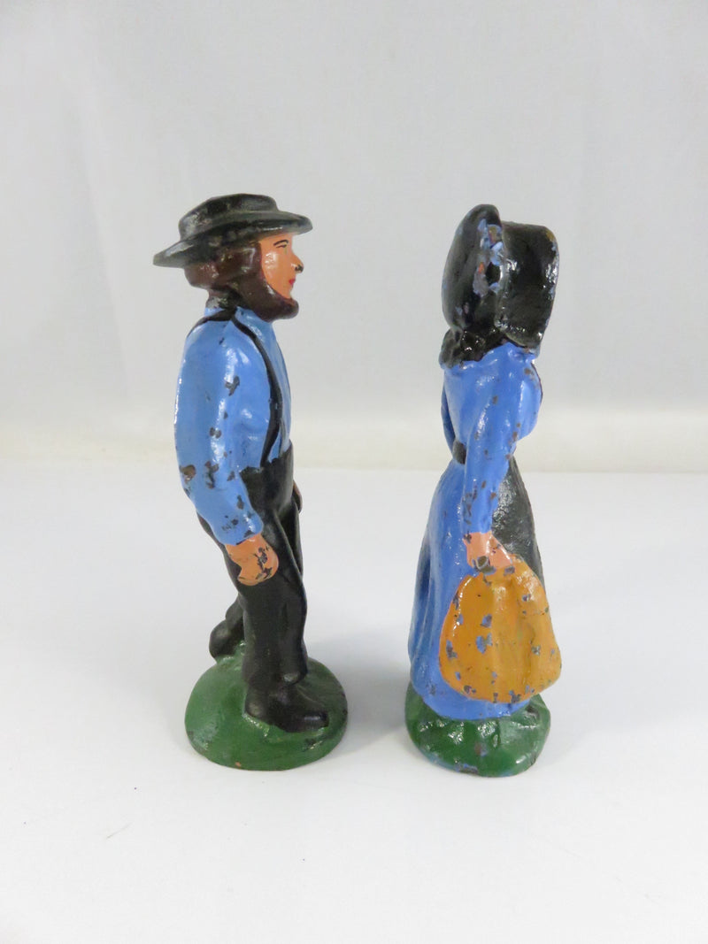 Vintage Cast Iron Amish Couple Figurines Hand-Painted Blue & Black approx. 4 1/4"