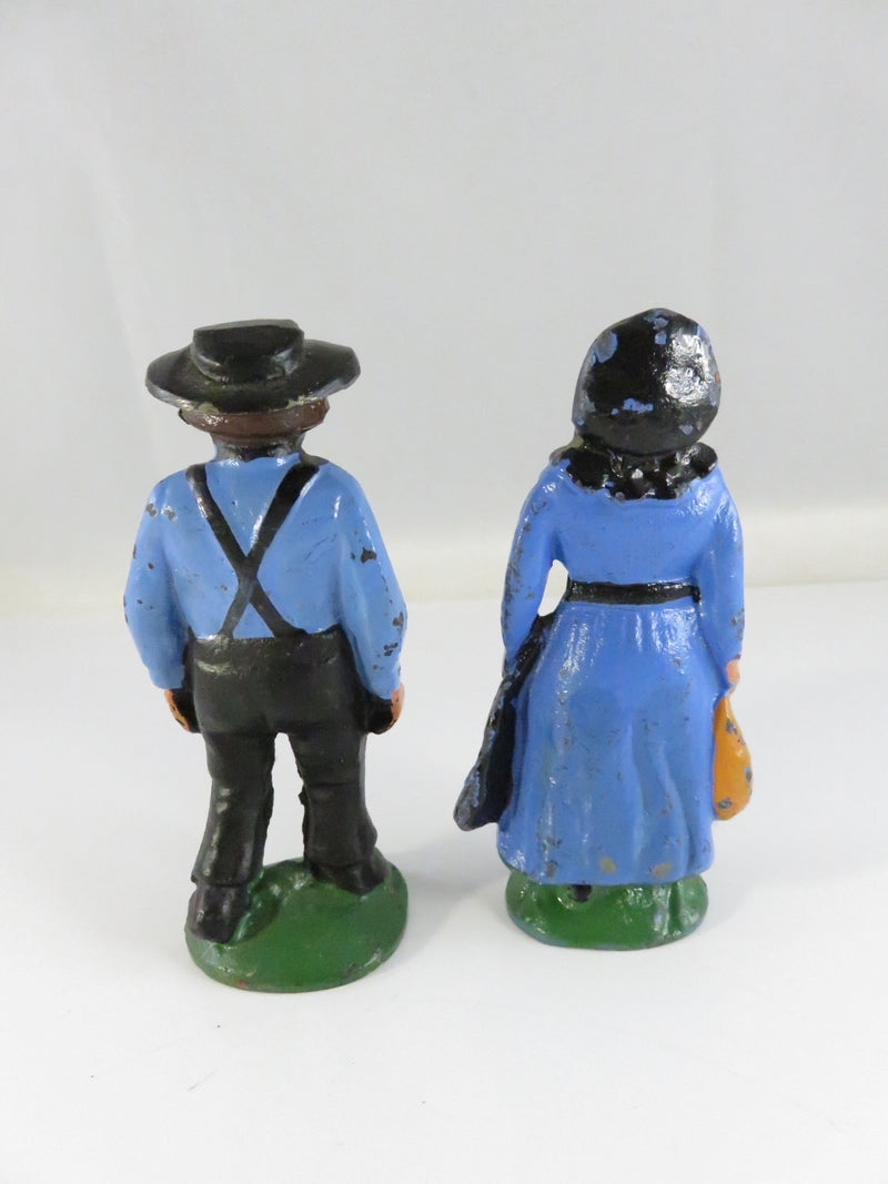 Vintage Cast Iron Amish Couple Figurines Hand-Painted Blue & Black approx. 4 1/4"