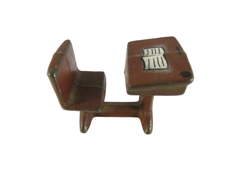 Small model of a desk and chair on a white background