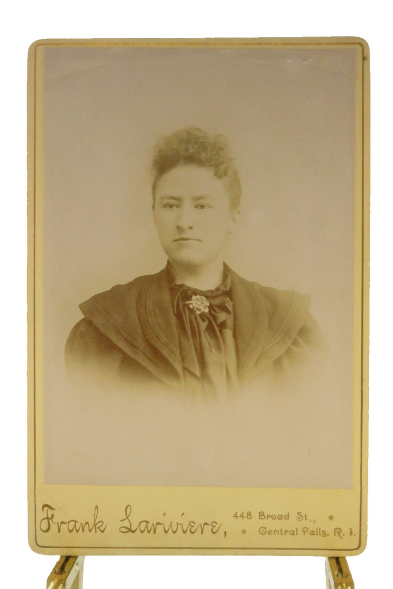 Antique Cabinet Card Woman with Carved Flower Pin Frank Lariviere, Central Falls — front view