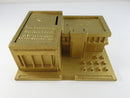 Gold-colored architectural model on a white background