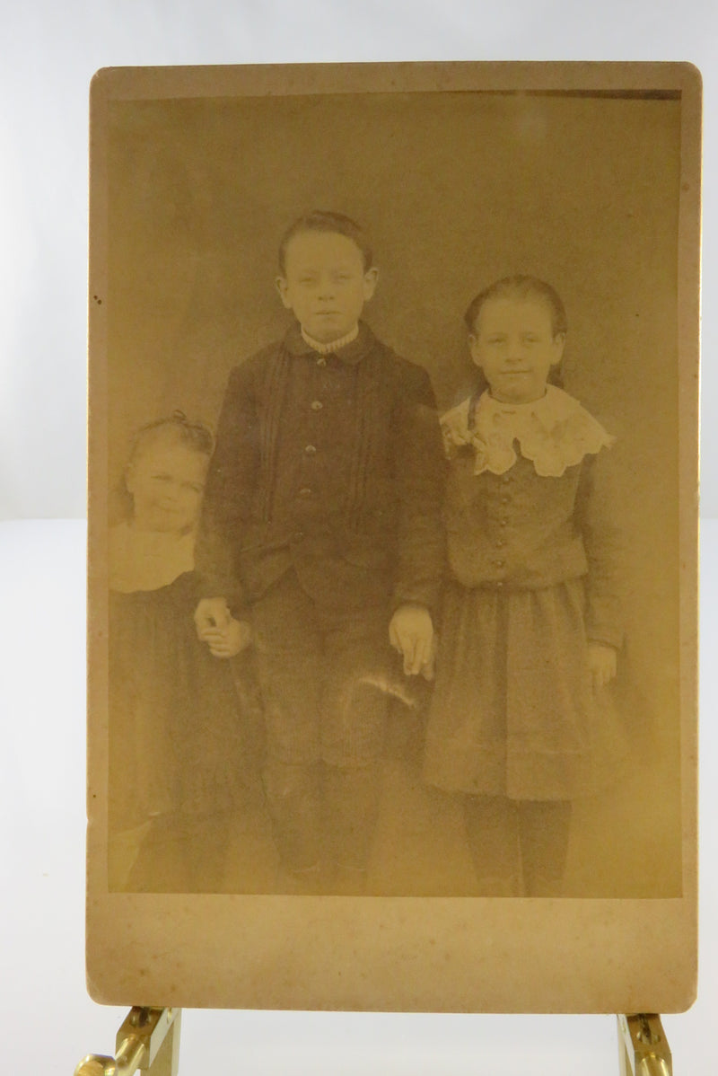 Antique Cabinet Card 1887 Boy and 2 Sisters holding hand Hidden Middle Finger