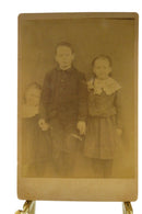 Antique Cabinet Card 1887 Boy and 2 Sisters holding hand Hidden Middle Finger — front view