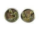 Pair of round metal buttons with floral design on a white background