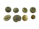 Collection of vintage buttons with different designs on a white background