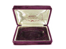 Open purple velvet benrus watch box with 'Benrus' branding on a white background