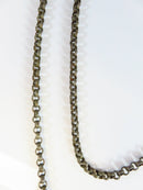 Antique White Metal 28" Necklace Rolo Chain With Pierced Metal Pendant product image for Just Stuff I Sell, clear front view, neutral background, original listing photo, optimized descriptive alt text, centered composition variant 4