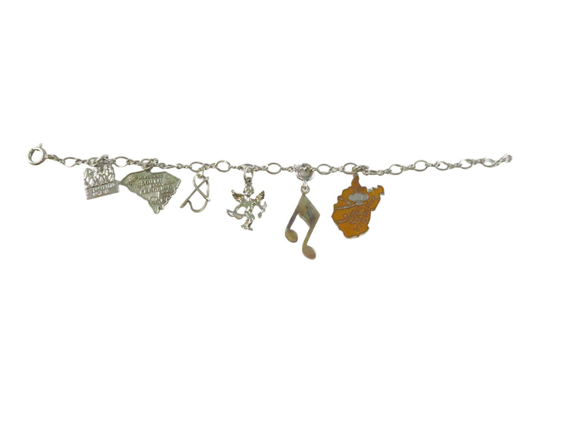 Bracelet with various charms on a white background