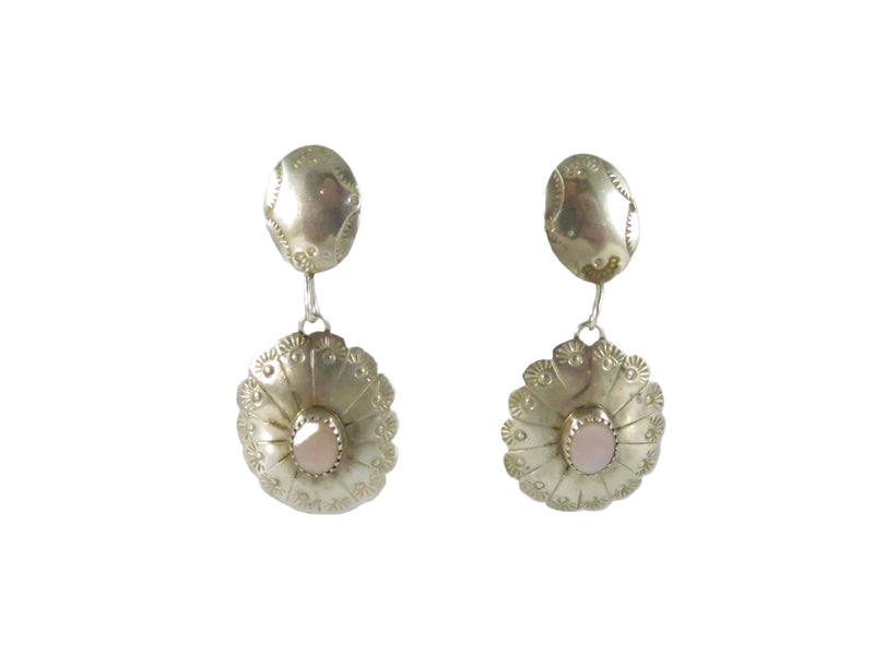 Pair of silver earrings with pink stones on a white background