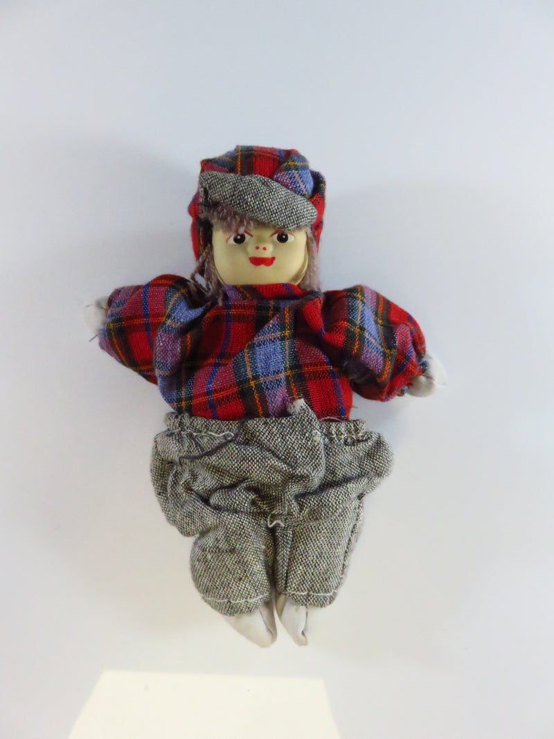 Vintage Flannel Dressed Girl Porcelain Head Sand Filled Body?