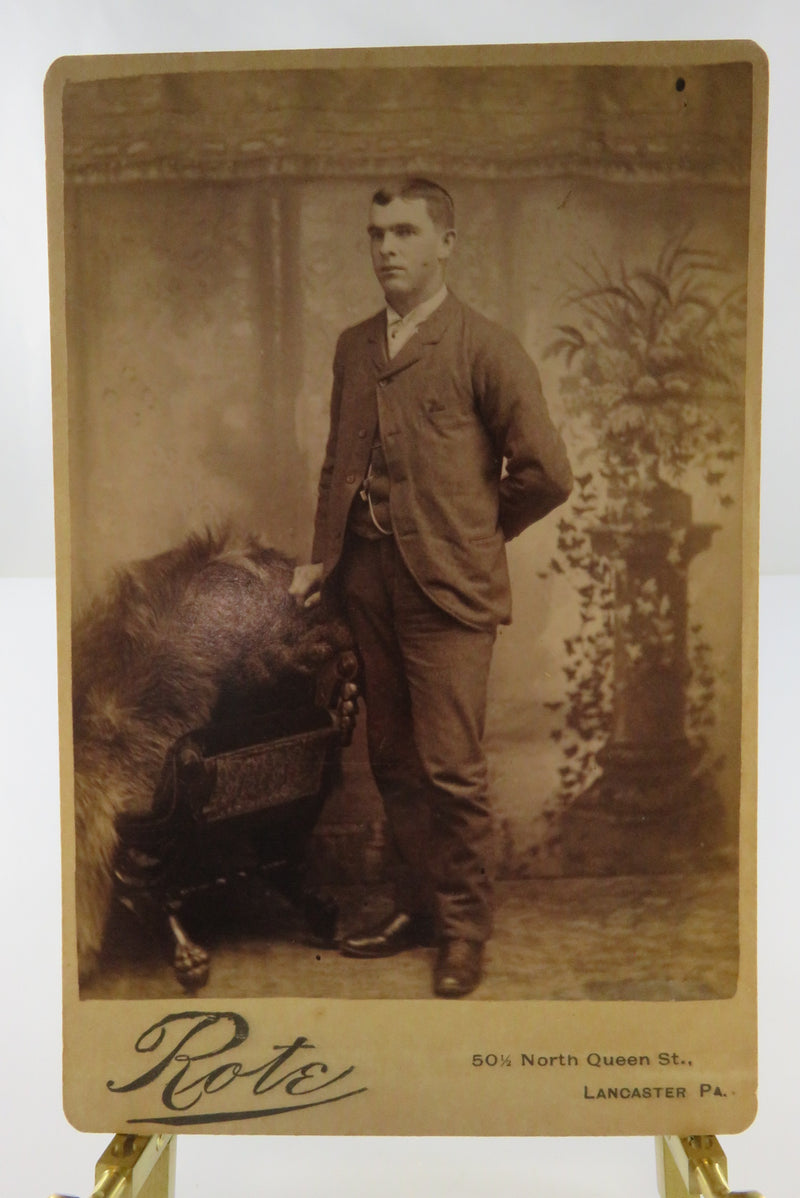 Man Leaning On Chair Antique Cabinet Card Rote Lancaster PA