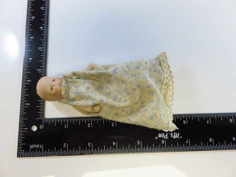 Vintage small 4" Approx Baby With Porcelain Head Arms and Legs