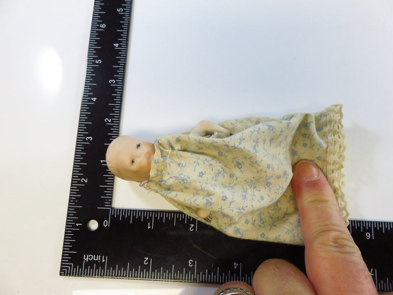 Vintage small 4" Approx Baby With Porcelain Head Arms and Legs