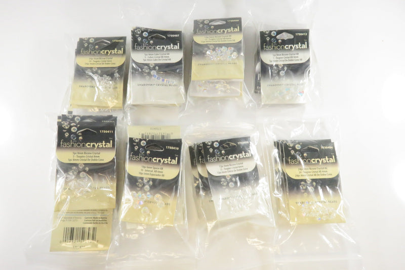 44 Packages of Various Swarovski Crystals Fashion 489 Crystal Beads New Old Stock — front view