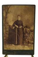 Woman Leaning on Gate Faux Stone Wall Antique Cabinet Card Strunk Reading PA product image for Just Stuff I Sell, clear front view, neutral background, original listing photo, optimized descriptive alt text, centered composition