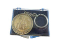 Keychain with gold-colored Disney World castle design in a clear case on a white background