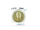 Medal with a portrait on a white background, labeled 'J.F.K. Pam.' and 'JR03177'.