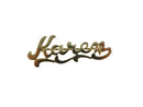 Gold name badge with 'Karen' on a white background