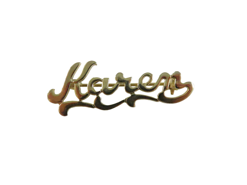 Gold name badge with 'Karen' on a white background