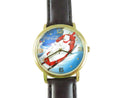 Wristwatch with Coca-Cola-themed face featuring a polar bear and Santa Claus on a white background