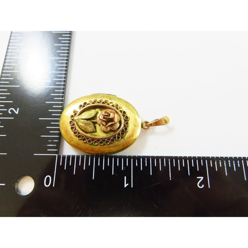 Gold Tone Oval Photo Locket With Rose Gold Rose Bud Design 1 1/8" High X 7/8" Wide