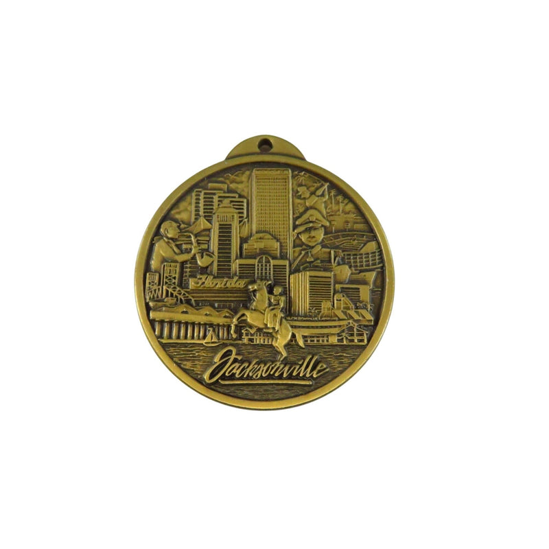 Jacksonville Kennel Club Bronze Tone Medallion 1.5" Dog Racing Souvenir With Skyline & Greyhound Design — front view