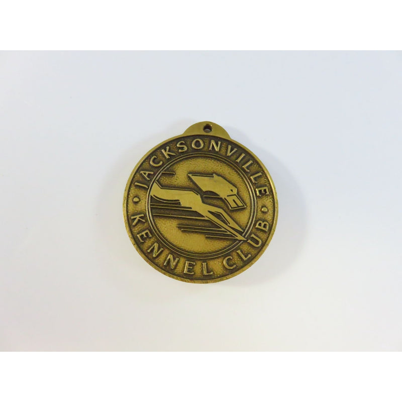 Jacksonville Kennel Club Bronze Tone Medallion 1.5" Dog Racing Souvenir With Skyline & Greyhound Design