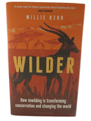 Front dust jacket of Wilder by Millie Kerr, showing an orange wildlife landscape with a silhouetted antelope and the subtitle How Rewilding Is Transforming Conservation and Changing the World.