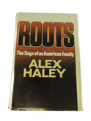 Front dust jacket of Roots: The Saga of an American Family by Alex Haley, with visible edge wear and chipping.