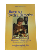 Front cover of How to Be a Jewelry Detective by C. Jeanenne Bell, G.G., with a photograph of Bell examining jewelry.
