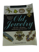 Front cover of Answers to Questions About Old Jewelry 1840-1950, 8th Edition, by C. Jeanenne Bell, G.G., illustrated with jewelry pieces.