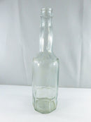 Clear Schmidt Bottling Co. crown-top soda bottle with embossed shoulder lettering and faceted lower base.