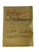 Worn front cover of The Fifth Antiques and Their Current Prices by Edwin G. Warman, with handwritten “Cord Tassel” and “Page 27” at the top and paper loss along the right edge.