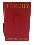 Front cover of Torchy by Sewell Ford in red cloth with gilt title lettering and a blind-stamped profile design.