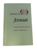 Green hardcover front cover of Studies in Jeremiah by Clyde T. Francisco, with a maroon scroll illustration.