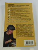 Back cover of the yellow paperback with a contents-style list of jewelry-identification clues, author photograph, and ISBN barcode.