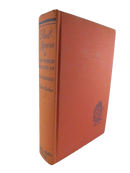 Angled view of the red cloth hardcover showing the spine lettering for Paul Revere and the World He Lived In by Esther Forbes.