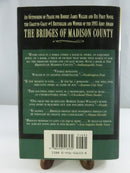 Rear dust jacket of Slow Waltz in Cedar Bend with praise for The Bridges of Madison County, barcode, price code 51695, and ISBN 0-446-51653-8.