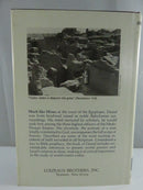 Rear dust jacket of Lectures on Daniel the Prophet, showing a photograph of Babylonian ruins and Loizeaux Brothers, Inc. Neptune, New Jersey imprint.