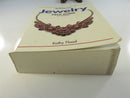 Back cover of Warman's Jewelry Field Guide with description, ISBN, and Krause Publications logo.