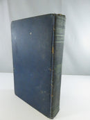 Blue cloth rear cover and damaged spine of Queenie Hetherton