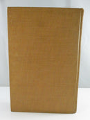 Plain tan cloth rear cover of The Spare Room hardcover.