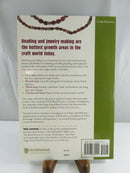 Back cover of the Interweave paperback, with a summary of jewelry-business guidance, ISBN 978-1-59668-024-1, and barcode.
