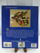 Rear cover of Creative Bead Jewelry showing bead jewelry photograph, Sterling Publishing Co., Inc. imprint, ISBN 0-8069-1306-1, and retail sticker.