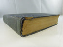 Detached and damaged lower spine and text block