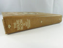 Spine of The Spare Room showing the title and Mrs. Romilly Fedden in faded white lettering with rose ornaments.