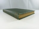 Lower page edge and worn green cloth corner
