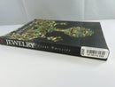 Spine of Jewelry by Clare Phillips, with title, author name, and a Thriftbooks barcode decal.